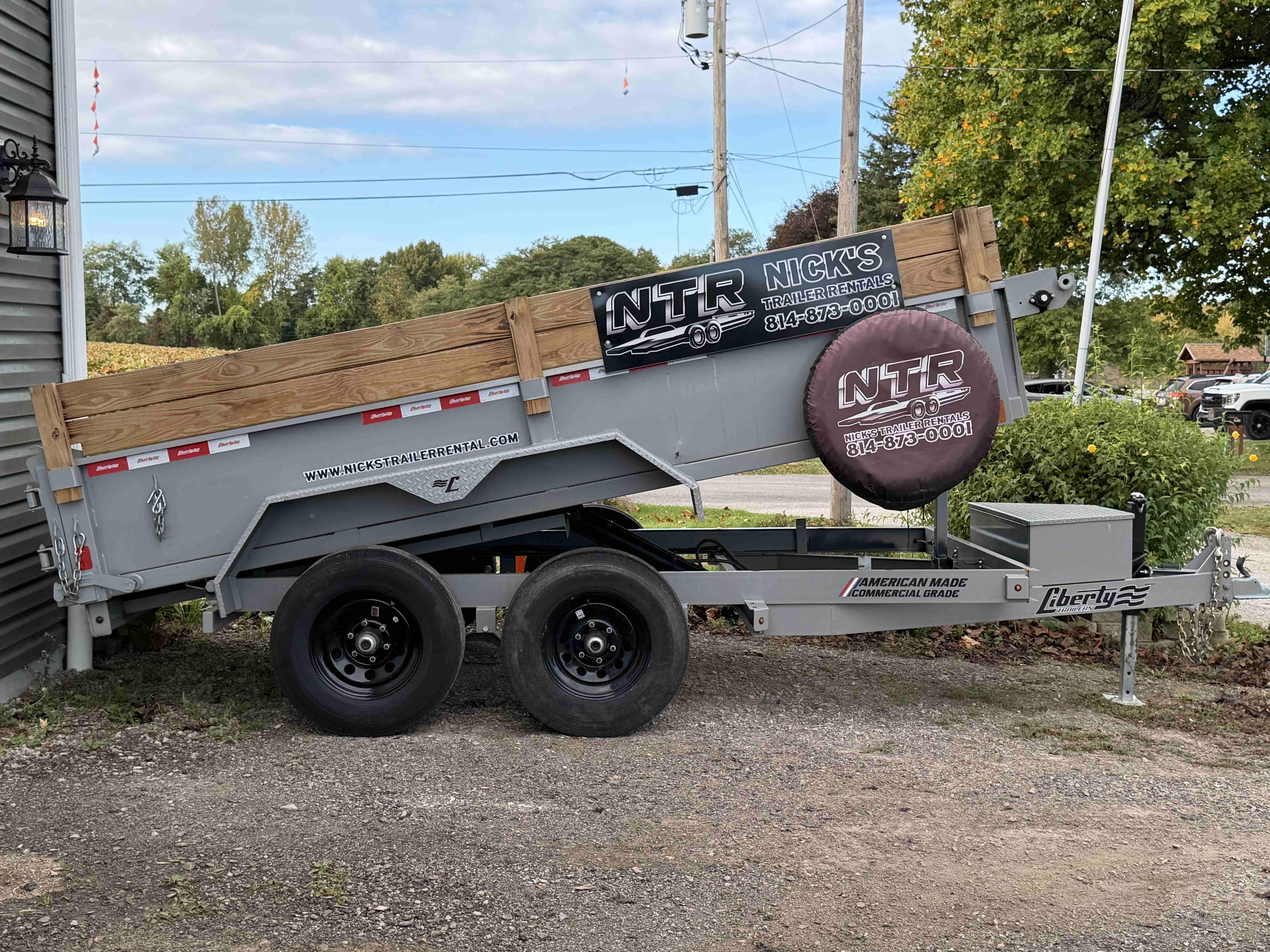 Dump trailer rental Erie PA - Heavy-duty dump trailer for construction and landscaping
